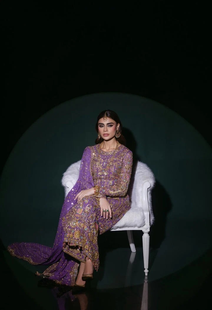 Nomi Ansari Couture pakistani fashion outfit in purple tones.
